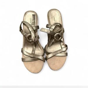 Lower East Side Gold metallic strappy heels.